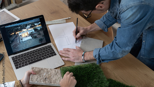 architects designing at their office table