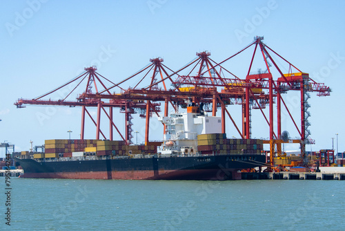 container cargo freight ship with cranes