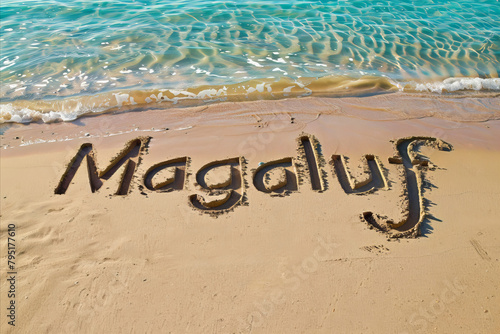 Magaluf, Spain written in the sand on a beach. Spanish tourism and vacation background photo