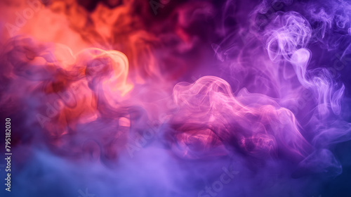 Vibrant and ethereal swirls of blue and pink smoke intertwining against a dark background, creating an abstract effect.