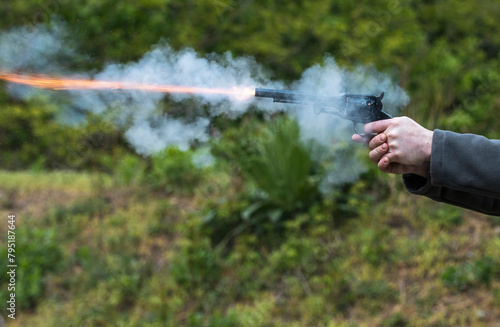Shooting with a revolver outdoor