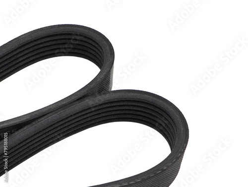 V-belt of the generator is isolated on a white background. Car engine tensioner belt isolated. Car timing belt. Spare parts photo