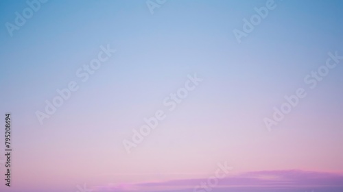 The serene skyline is painted with soft purples and pinks, as dusk brings a quiet end to the day. photo
