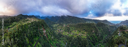 Madeira Island landscape, small village on hills and green lush forest. Aerial drone view. Portugal travel. © marcin jucha