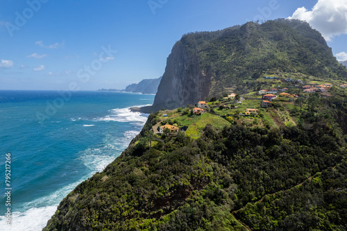 Madeira coast, green lush hills and Atlantic Ocean. Aerial drone view © marcin jucha