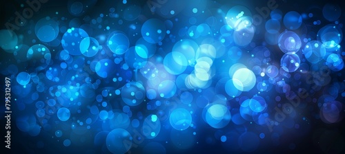 Abstract blue bokeh lights creating a beautifully defocused and blurred background for design