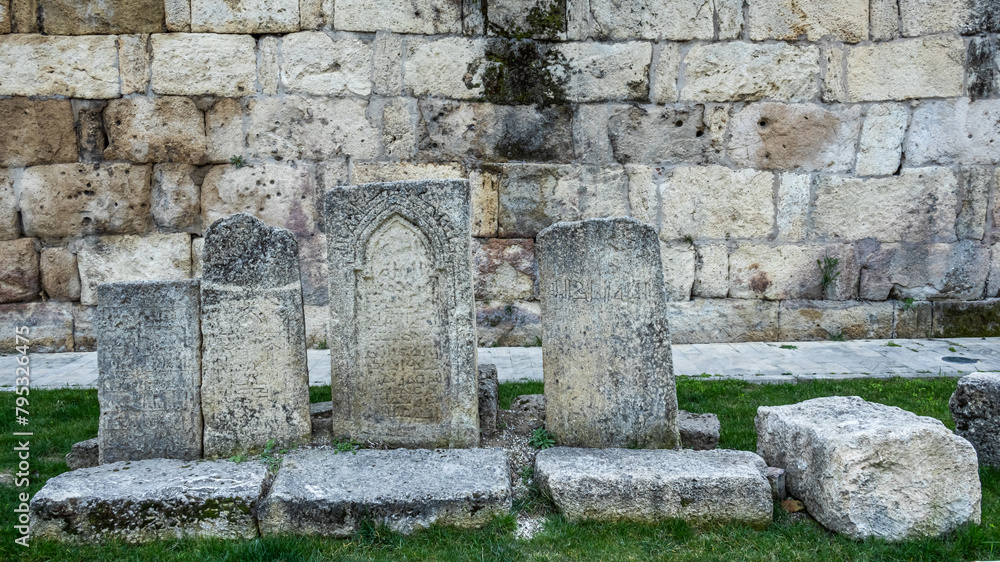 Ancient tombstones near the fortress wall. It is a monument of ancient Persian fortification architecture. History and religion.