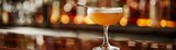 bartender making a fancy cocktail drink with orange liquor