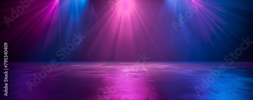 Empty stage with dark blue, purple, and pink background, ready for performance or presentation.