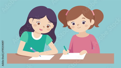 A pair of young girls sitting side by side at a desk hunched over the same sheet of paper as they enthusiastically draft their first letter to