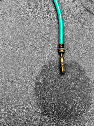 hose on asphalt