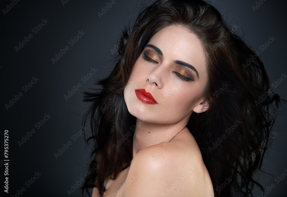 Naklejka premium Calm, wellness and woman in studio for hair beauty, cosmetics and luxury glamour on black background. Makeup, skin and model with shampoo, scalp or glow haircare results, growth and smooth texture