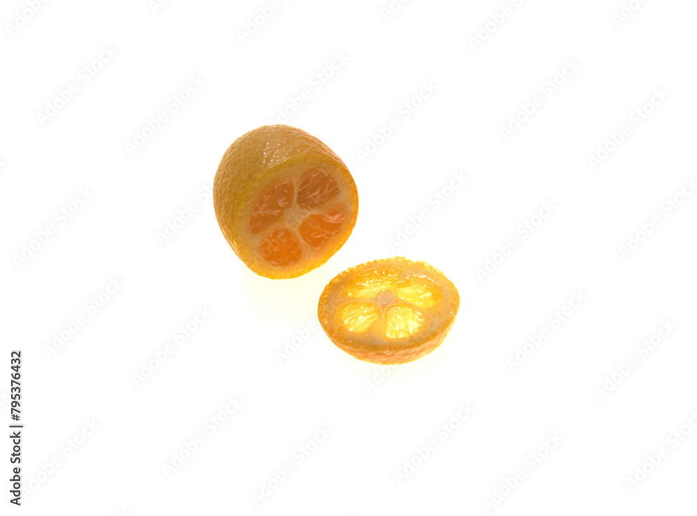 Sliced fruit of Kumquat tree, orange fruits of fortunella margarita, ornamental houseplant native to Southern China, on white background Sliced fruit of Kumquat tree, orange fruits of fortunella margarita, ornamental houseplant native to Southern China, on white background
