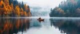 Rowing Through Tranquility: Aerial Scene of Small Boat on Serene Autumn Lake, a Moment of Peace