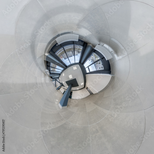 abstractly twisted into spherical 360 panorama interior of modern office with hall staircase and panoramic windows