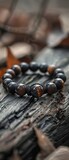 A bracelet made of beads and a black stone