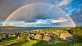 scenic view of rainbow over reine village
