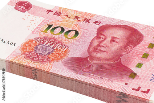 Yuan money isolated on white background. Stack of one hundred yuan bill. Chinese Bank Note 100 Yuan in isolated white background. Chinese currency