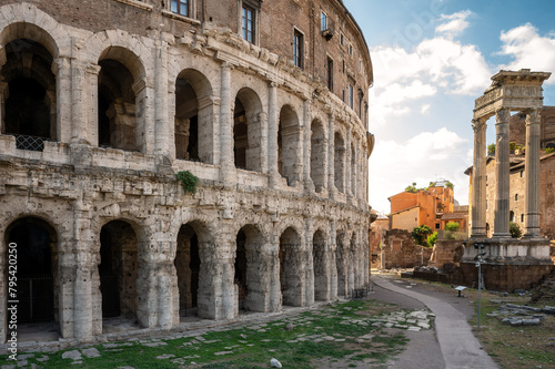 Beautiful panoramic view on the ruins of ancient open-air Theatre of Marcellus (Teatro di Marcello) in sunny day, Rome, Italy photo