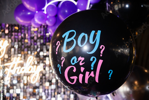 balloon with the inscription boy or girl at the gender party