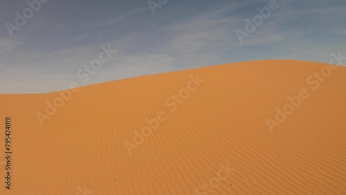 POV driving car through Erg Chebbi sand dunes of Sahara desert in southeastern Morocco photo