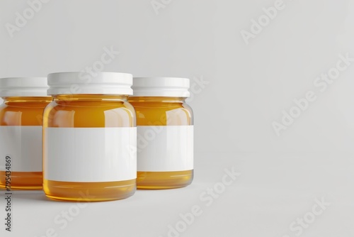 Artisanal Honey Jars with Blank Labels on White Background