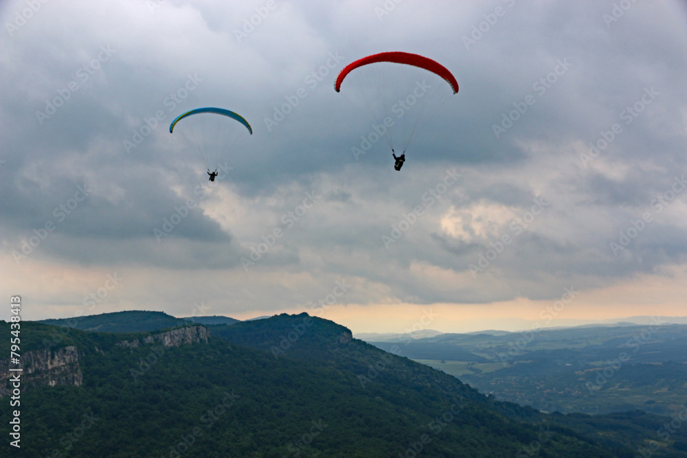 Paragliders flying in Central Bulgaria Paragliders flying in Central Bulgaria