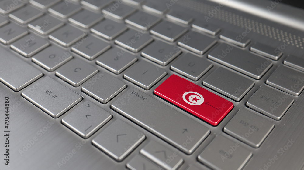 Keyboard with Tunisia flag on the enter button, represents cyber attack, learning language