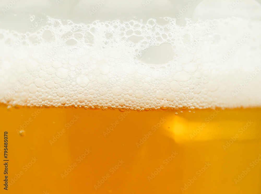 Light beer in a glass before consumption Light beer in a glass before consumption