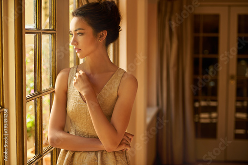 Fashion, window and woman in vintage home for gala event in style, classy outfit and formal clothes. Wealth, aesthetic and person with confidence, pride and luxury in elegant manor, house and mansion