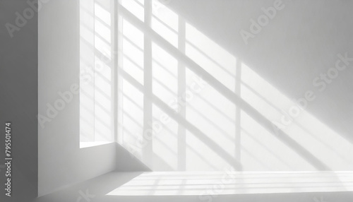 Monochrome background of light and shadow shining through the window