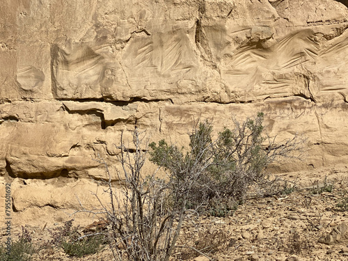 Early graffiti marked 1887 at Chaco Culture National Historical Park in New Mexico. Chaco Canyon was a major Ancestral Puebloan culture center and has many pueblos. Petroglyph trail. photo