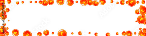 Vitamin E round capsules scattered randomly.