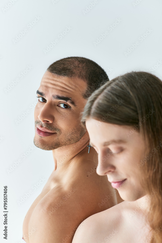 Two men gaze into each others eyes intently. Two men gaze into each others eyes intently.