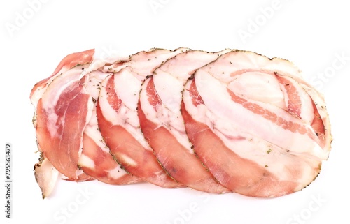 Foto Slices of Guanciale, italian cured meat made from pork jowl, on white background