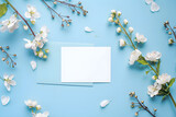 Stylish elegant flat lay blue floristic greeting invitation post card with copy space.