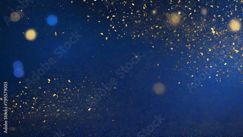 Golden glitter bokeh on blue background. Christmas and New Year concept
