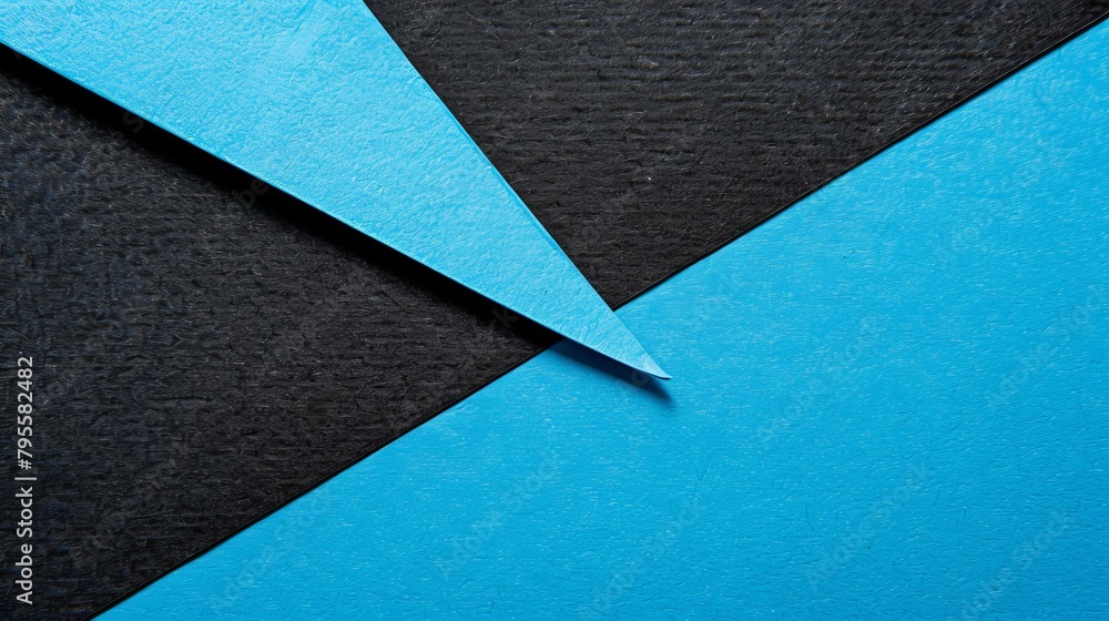 Textured blue and black paper layers in abstract close-up Textured blue and black paper layers in abstract close-up