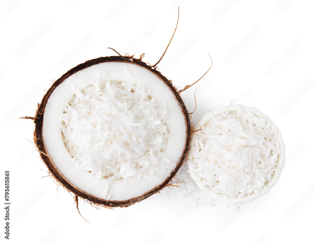 Naklejka premium Coconut flakes and nut isolated on white, top view