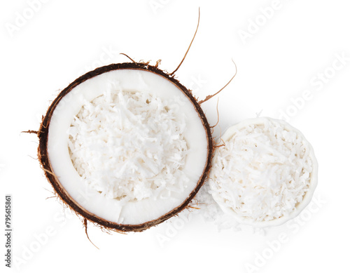 Coconut flakes and nut isolated on white, top view