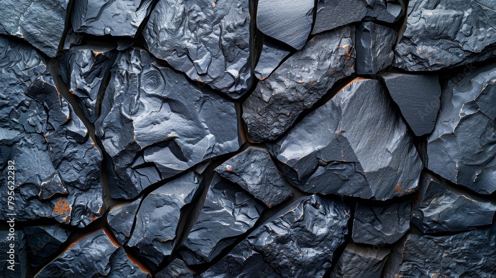 A meticulously crafted close-up of a metal-like rock wall, coated in a uniformly applied black paint A meticulously crafted close-up of a metal-like rock wall, coated in a uniformly applied black paint