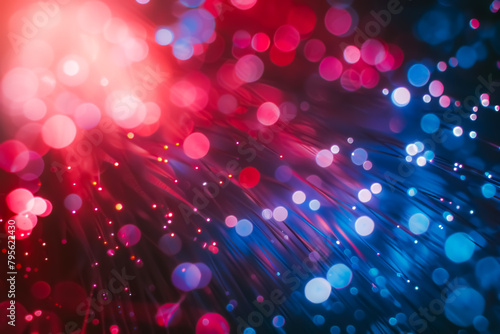 Abstract fiber optic light background with bokeh effect, red and blue colors