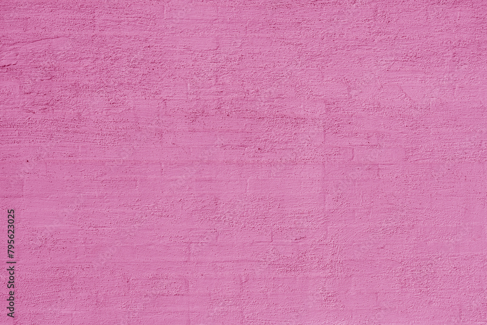 Unevenly plastered pink old wall. Abstract construction background Unevenly plastered pink old wall. Abstract construction background