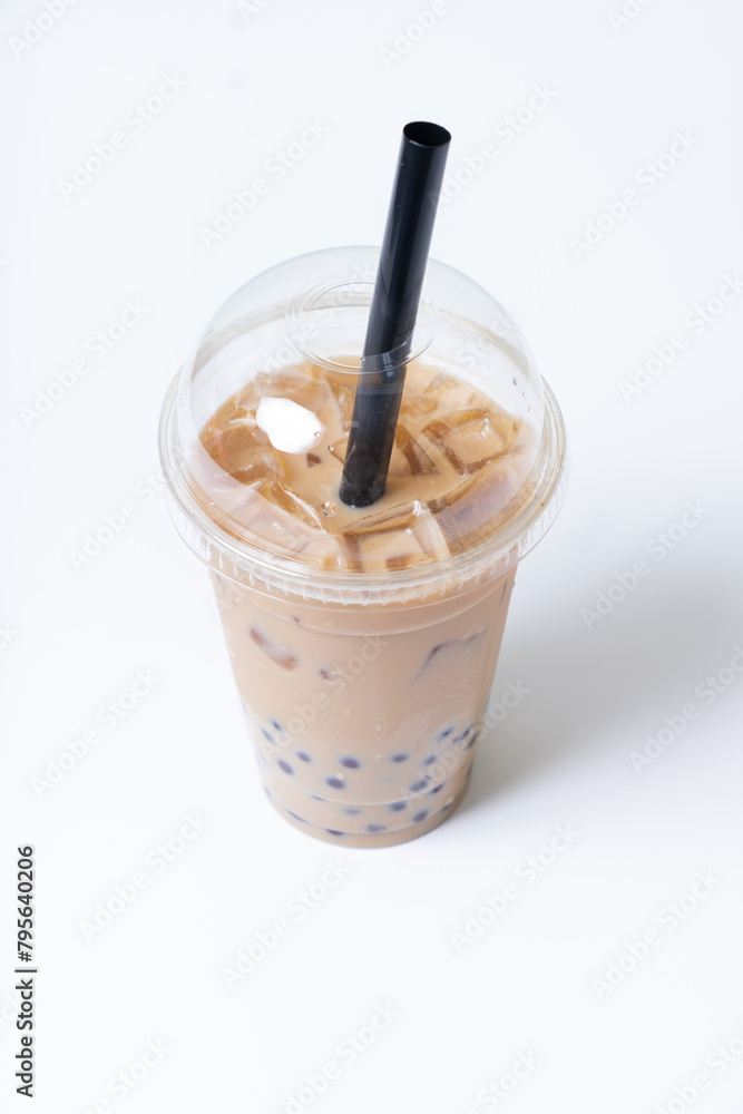 Plastic glass with bubble tea and ice. Trendy summer drink on white background Plastic glass with bubble tea and ice. Trendy summer drink on white background