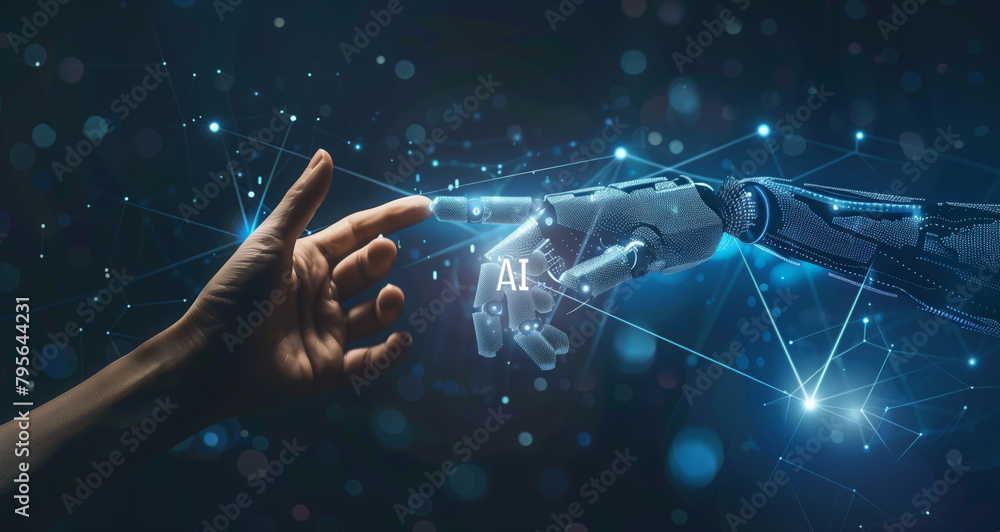 A human hand and robot finger touch each other on a dark blue ...
