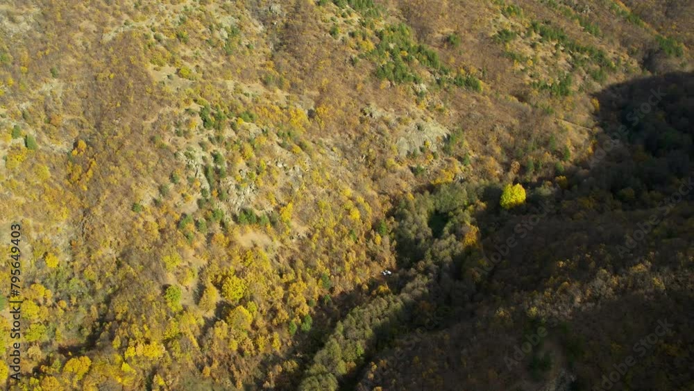 Drone flies over mountain valley of wooded Nidze in North Macedonia Drone flies over mountain valley of wooded Nidze in North Macedonia