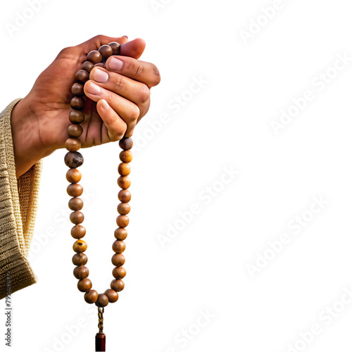 a close up of a person hands holding prayer bead photo