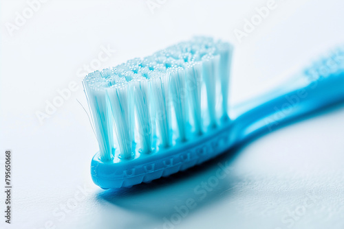 Close Up of Blue Toothbrush on White Background