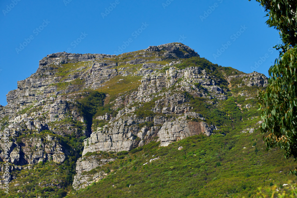 Green, mountain and sky at countryside with environment, sustainability and growth in summer. Hill, beauty and nature with grass in daylight for eco friendly, sunshine and foliage on earth in Italy Green, mountain and sky at countryside with environment, sustainability and growth in summer. Hill, beauty and nature with grass in daylight for eco friendly, sunshine and foliage on earth in Italy