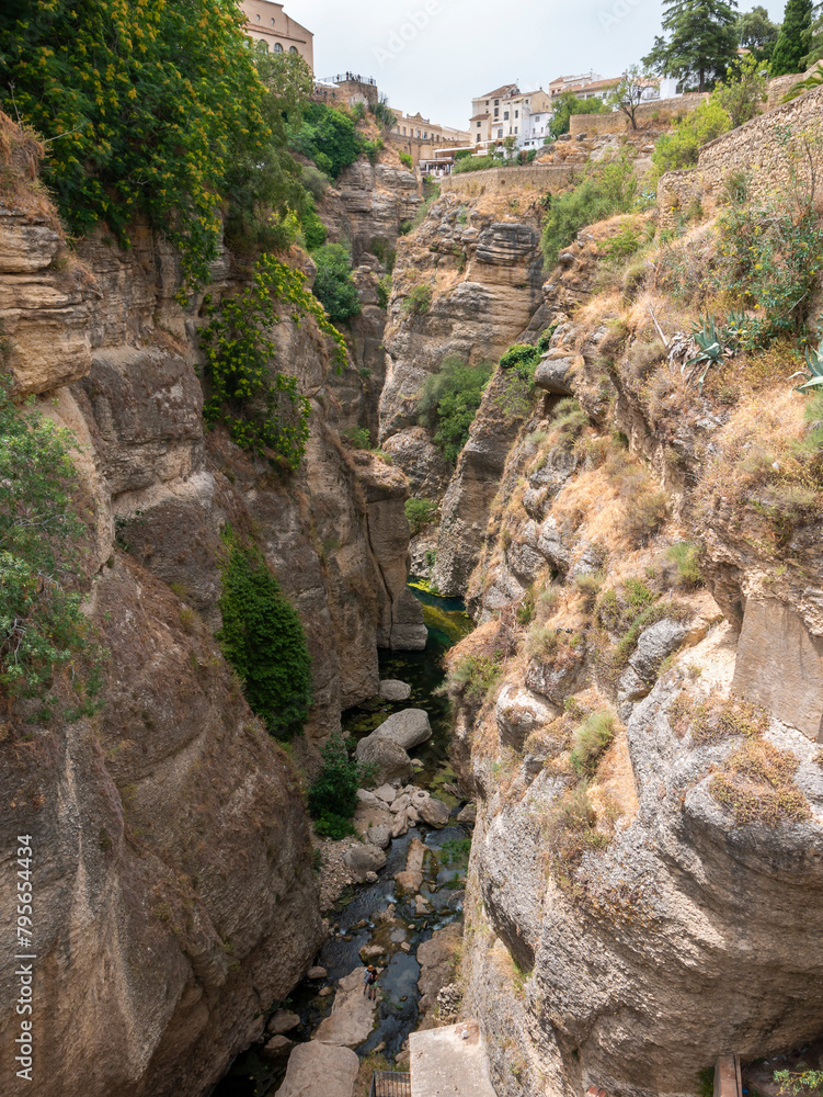 El Tajo Gorge with white houses atop in Ronda, Spain
